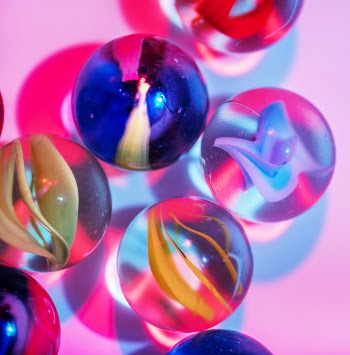 Selective Focus Photography of Assorted-color Marble Toys