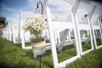 Selective Focus Photography of Baby's-Breath Flowers in Glass Jar