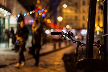 selective focus photography of bicycle handlebar