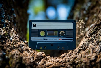 Selective Focus Photography of Black Cassette Tape