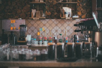 Selective Focus Photography of Blender, Containers, and Bottles