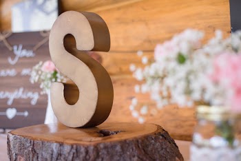 Selective Focus Photography Of Brown S Freestanding Letter
