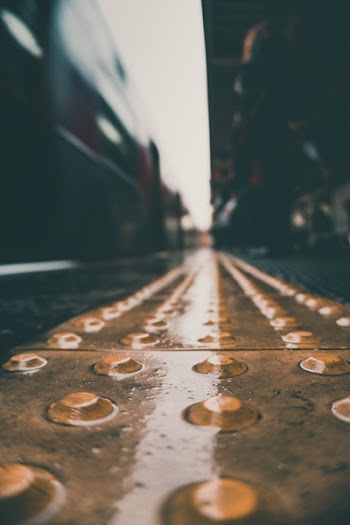 Selective Focus Photography of Brown Sidewalk
