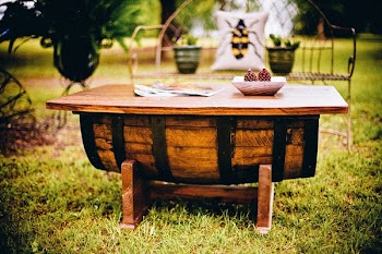 Selective Focus Photography of Brown Wooden Barrel Table