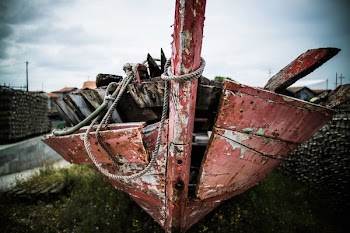 selective focus photography of brown wooden boat