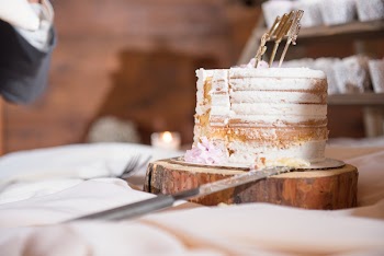 Selective Focus Photography Of Cake On Brown Wood Slab