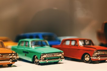 Selective Focus Photography of Classic Car Die Cast Models