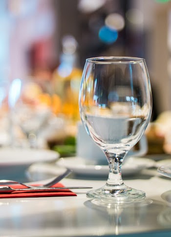 Selective Focus Photography of Clear Wine Glass