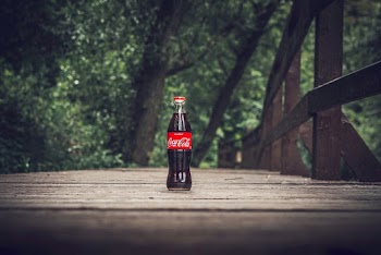 Selective Focus Photography of Coca-cola Bottle