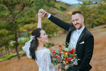 Selective Focus Photography of Couple on Brown Grass Field