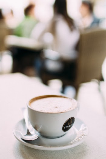 Selective Focus Photography of Cup of Coffee