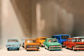 Selective Focus Photography of Die Cast Model Toy Cars