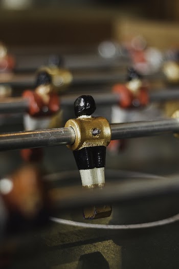 Selective Focus Photography Of Foosball Game