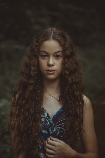 Selective Focus Photography of Girl Wearing Blue Dress