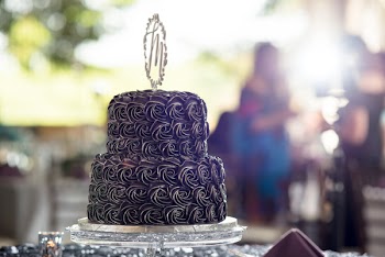 Selective Focus Photography of Gray Icing-covered Round 2-layer Cake