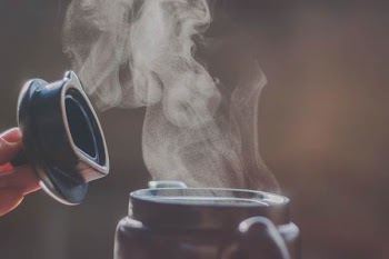 Selective Focus Photography Of Jar Releasing Smoke