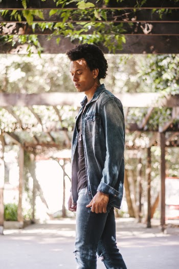 Selective Focus Photography Of Man In Blue Denim Jacket