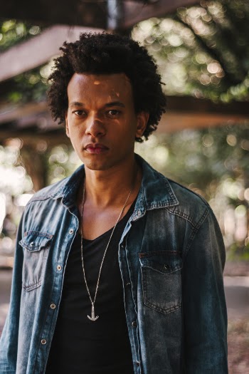 Selective Focus Photography Of Man In Blue Denim Jacket And Black Shirt