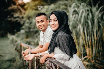 Selective Focus Photography of Man in White T-shirt Beside Woman Wearing White Top