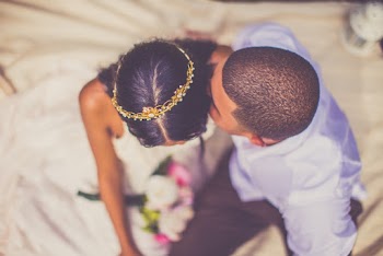 Selective Focus Photography of Man Kissing a Woman's Cheek