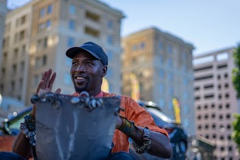 Selective Focus Photography of Man Wearing Cap