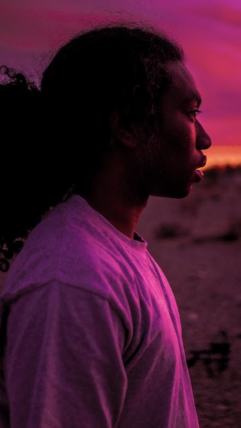 Selective Focus Photography Of Man Wearing Crew-neck Top