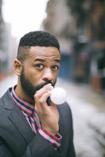 Selective Focus Photography of Man Wearing Gray Notch Lapel Suit Jacket
