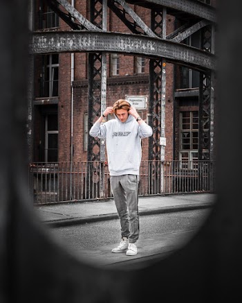 Selective Focus Photography of Man Wearing Hoodie