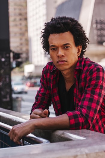 Selective Focus Photography of Man Wearing Red and Black Plaid Shirt