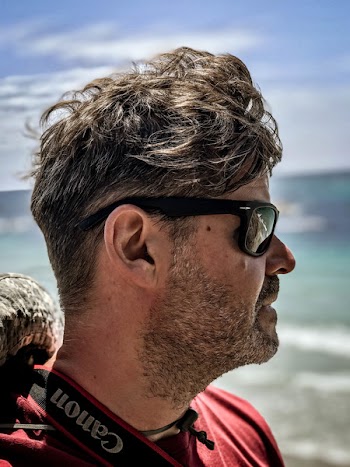 Selective Focus Photography of Man Wearing Sunglasses