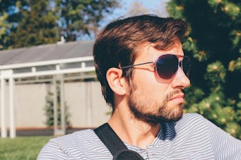 Selective Focus Photography of Man Wearing Sunglasses