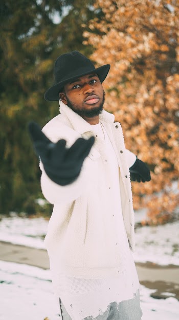 Selective Focus Photography of Man Wearing White Coat and Black Hat