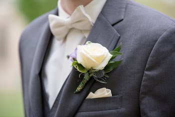 Selective Focus Photography of Men's Gray Notched Lapel Suit Jacket