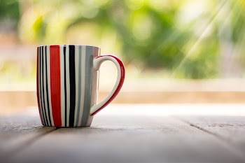 Selective Focus Photography of Mug