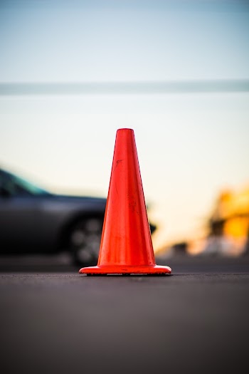 Selective Focus Photography of Orange Road Cone