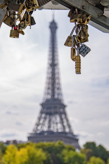 Selective Focus Photography of Padlocks With Eiffel Tower in Background