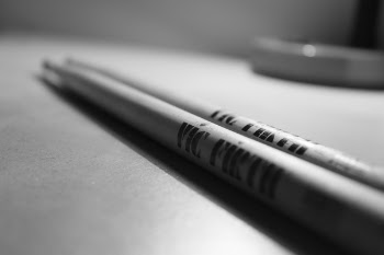 Selective Focus Photography of Pair of Drumsticks