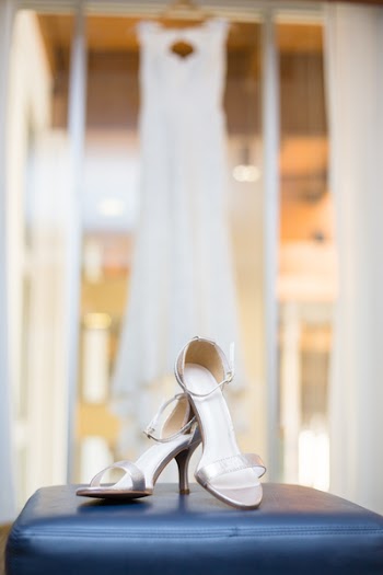 Selective Focus Photography of Pair of Silver Open-toe Ankle-strap Heeled Pair of Shoes