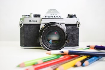 selective focus photography of Pentax K1000 camera
