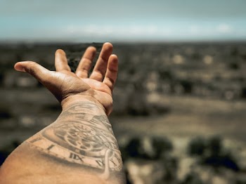 Selective Focus Photography of Person's Arm With Tattoo