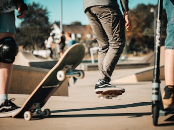 Selective Focus Photography of Person Doing Skateboard Stunts
