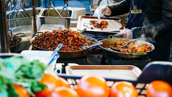 Selective Focus Photography of Person Preparing Food