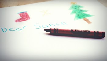 Selective Focus Photography Of Red Crayola Crayon Placed on White Paper
