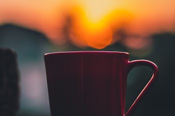 Selective Focus Photography of Red Mug