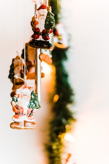 Selective Focus Photography of Santa Claus Wind Chimes