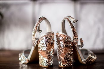 Selective Focus Photography of Silver and Bronze Colored Sequin Open-toe Sandals