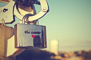 Selective Focus Photography of Silver-colored Padlock