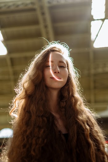 Selective Focus Photography of Smiling Woman 