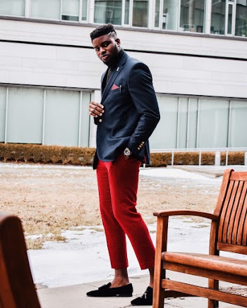 Selective Focus Photography of Standing Man Wearing Blue Suit