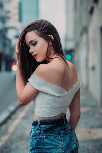 Selective Focus Photography of Standing Woman 